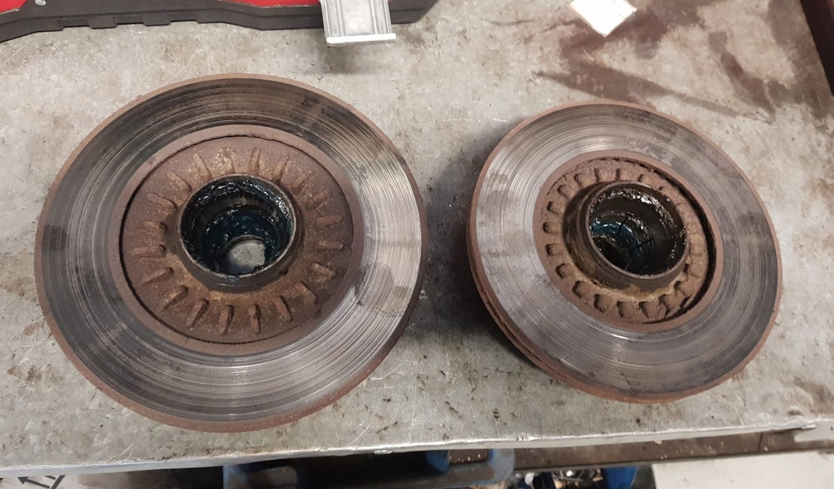 2 different sized rotors installed on vehicle by another mechanic.